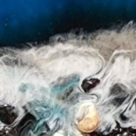 Abstract art of ocean waves with rocks and foam.